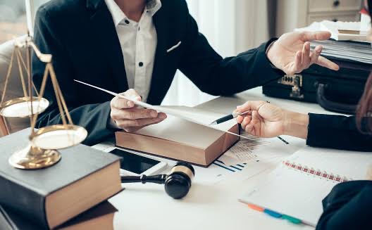 A Business advisory consultant guiding an SME manager on the financial framework of his business